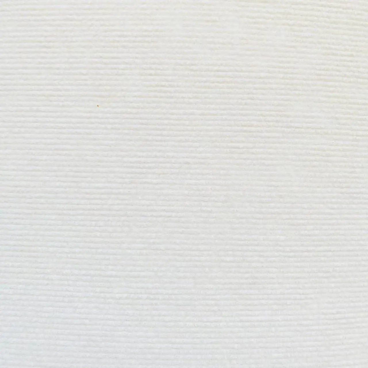 Close-up of a textured white non-woven material for the Cat Scratcher Sofa Protector Cats Scratcher Pad.